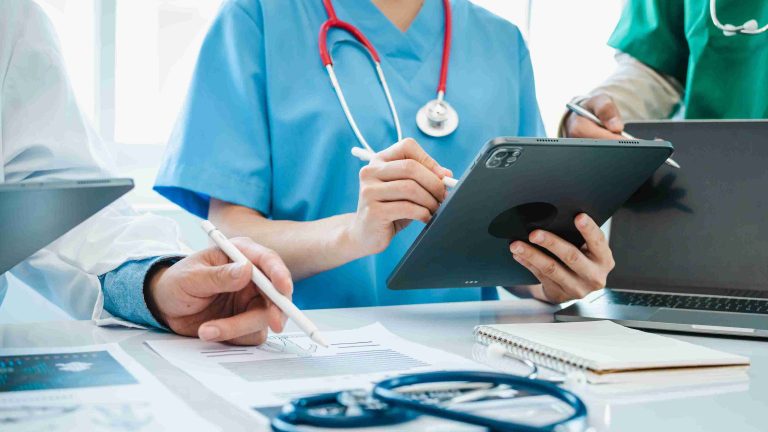 healthcare workers using technology