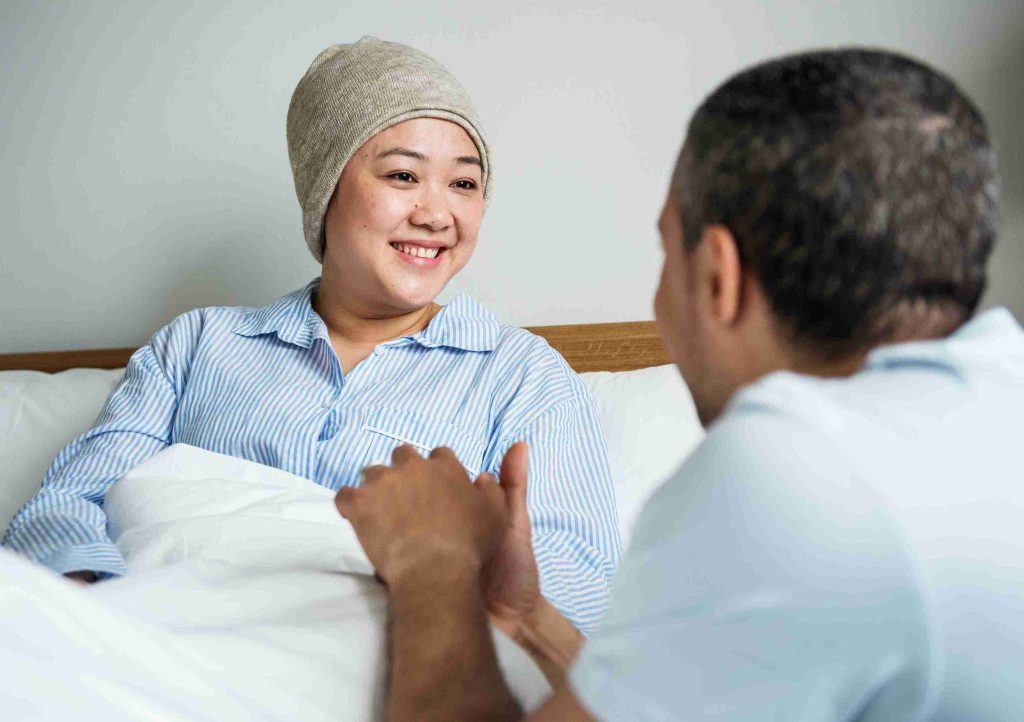 cancer patient smiling at her significant other