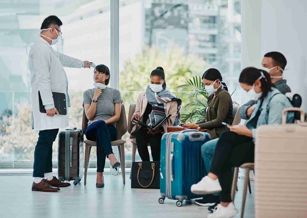 doctor checking travellers