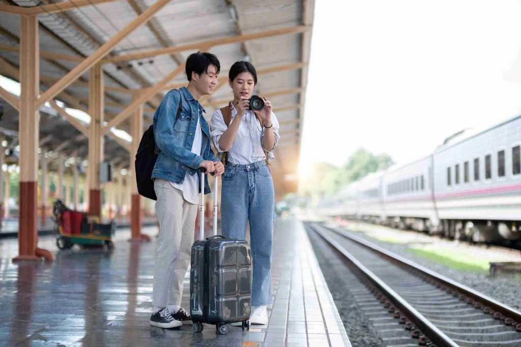 two young travellers looking at the camera