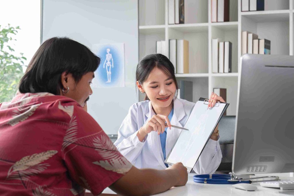 male patient consulting with a female doctor