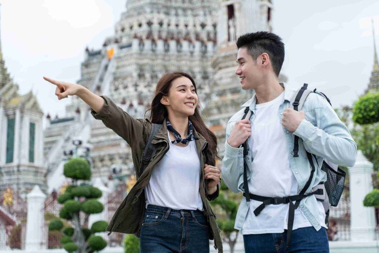Asian couple travelling in another country.