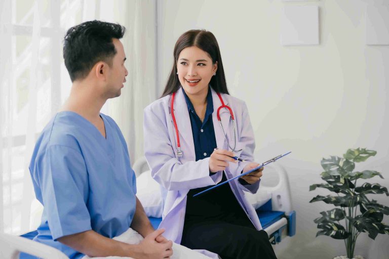 Female doctor speaking with a patient.