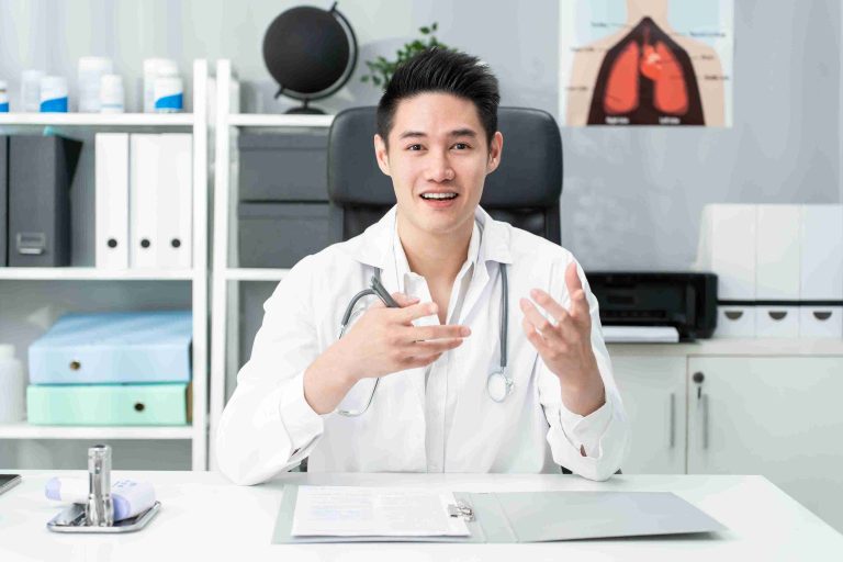 Young doctor explaining something to the patient.