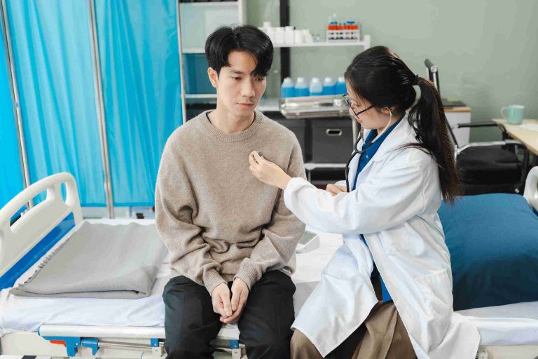 Doctor examining a patient in her clinic.
