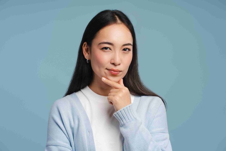 Asian woman thinking about something.