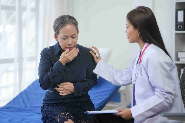 Doctor comforting an elderly patient.